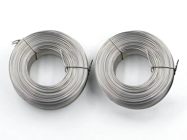 Two rolls of black annealed box baler wire.