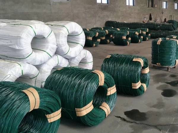 Several coils of PVC coated wires are in the warehouse.